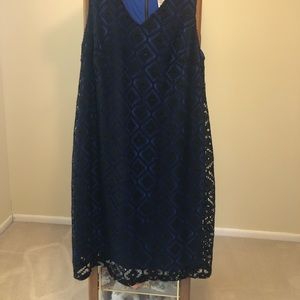 Catherine’s size 24 sleeveless royal dress with black lace overlay.